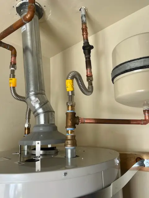 Water heater installation and plumbing repair in Dayton Triangle